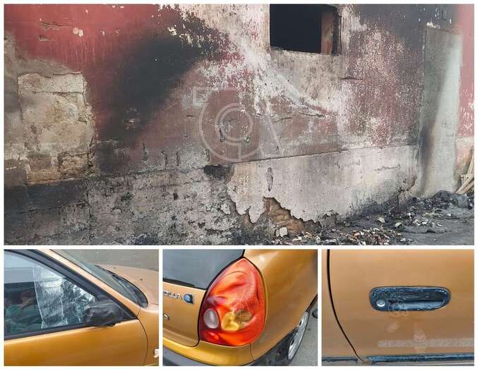 Estado en que quedaron los contenedores y uno de los vehículos afectados en la calle de Barcelona/TA.